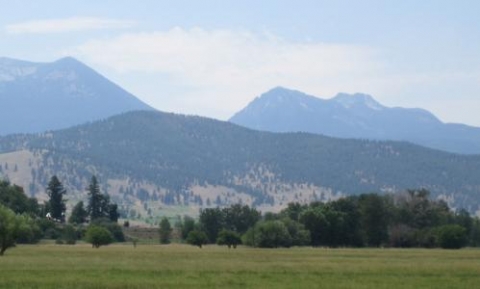 The mountains from afar, Anthony looming on the right.